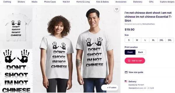 印有“Don't shoot,I am not Chinese”的T恤。 印有“Don't shoot,I am not Chinese”的T恤。