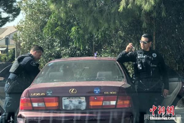 资料图:美国警察。中新社记者 张朔 摄 资料图:美国警察。中新社记者 张朔 摄