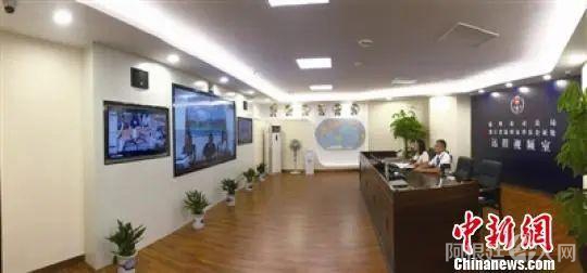 资料图：温州市司法局通过远程视频技术开展海外远程视频公证取证试点工作。　陈彩霞　摄