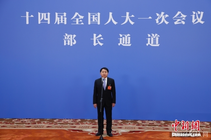 图为国家市场监督管理总局局长罗文接受媒体采访。中新社记者 韩海丹 摄